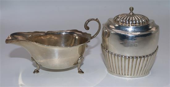 Silver half-reeded tea caddy and a sauce boat